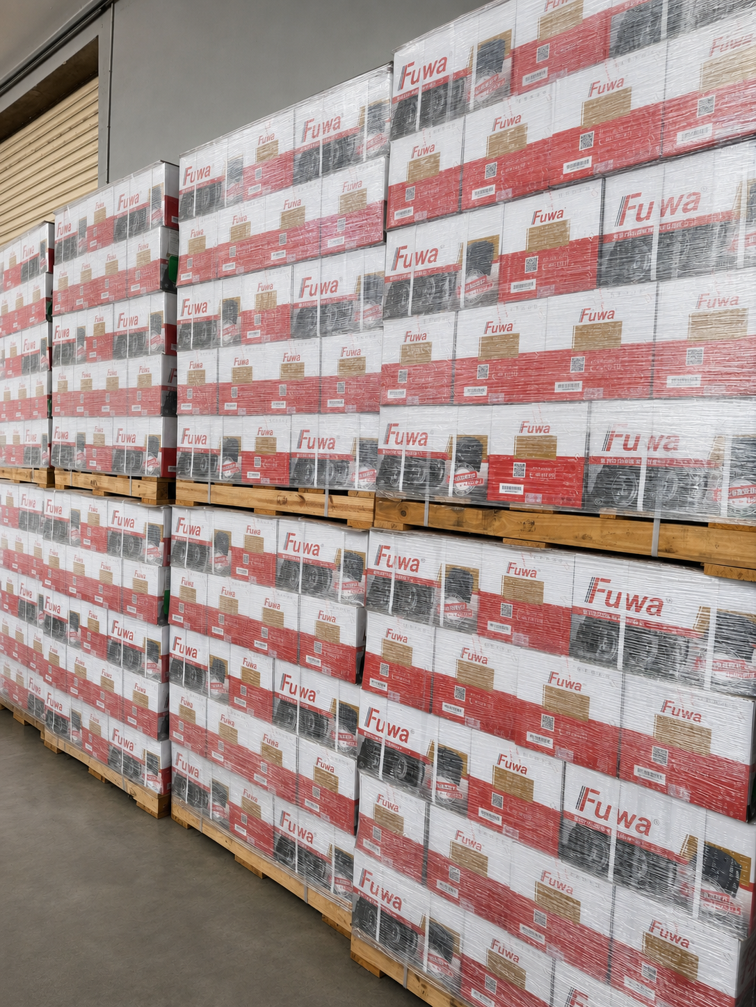 Palletized FUWA parts in original cartons at the parts warehouse